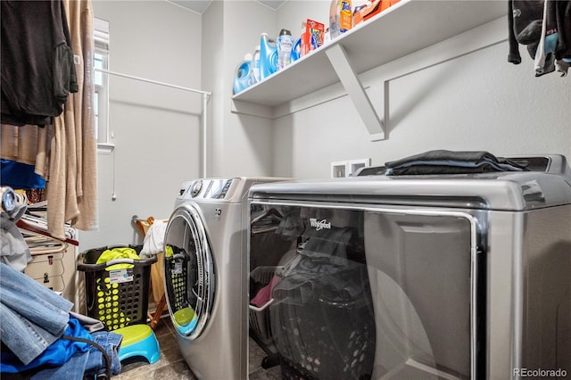 laundry room featuring washer and clothes dryer