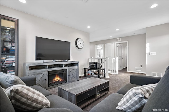 living room with dark carpet