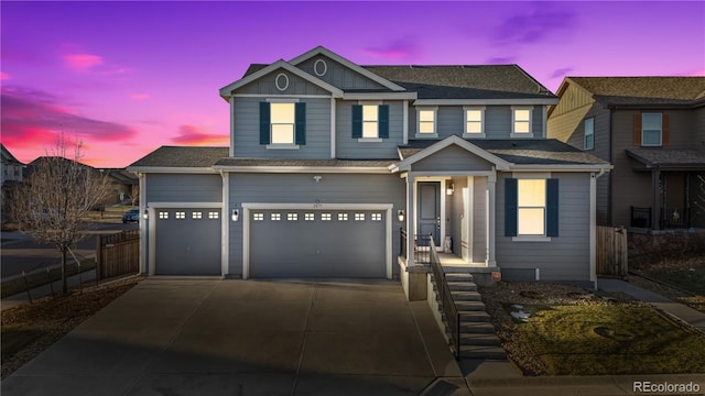 view of front of property featuring a garage