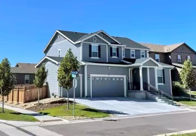 view of front of property featuring a garage