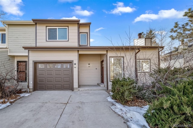 view of front of property with a garage