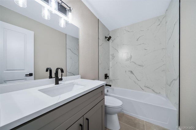 full bathroom with tiled shower / bath, vanity, tile patterned floors, and toilet