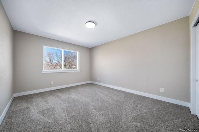 view of carpeted spare room