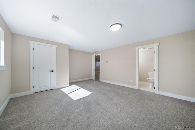 empty room with carpet flooring