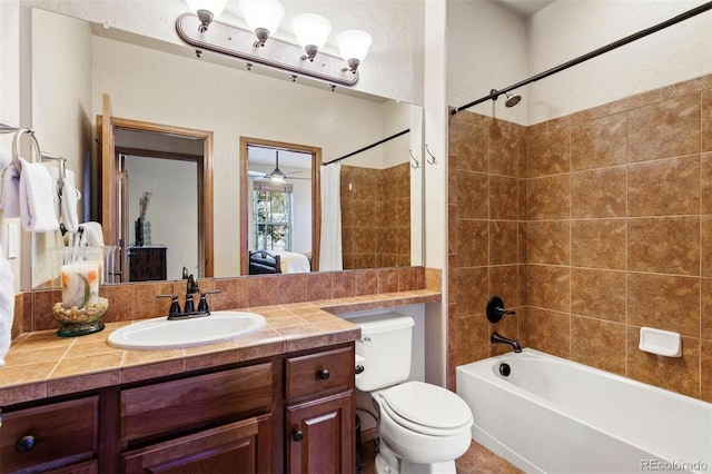 full bathroom featuring toilet, tub / shower combination, and vanity