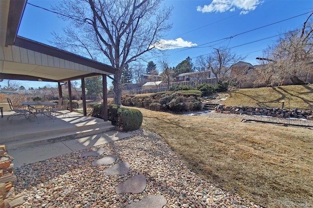 view of yard featuring a patio area and fence