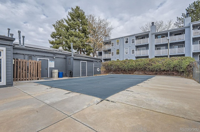 view of swimming pool with a patio area