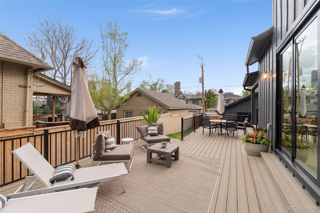 2351 N Emerson St, Denver, CO 80205 - wooden deck with outdoor dining area and an outdoor hangout area