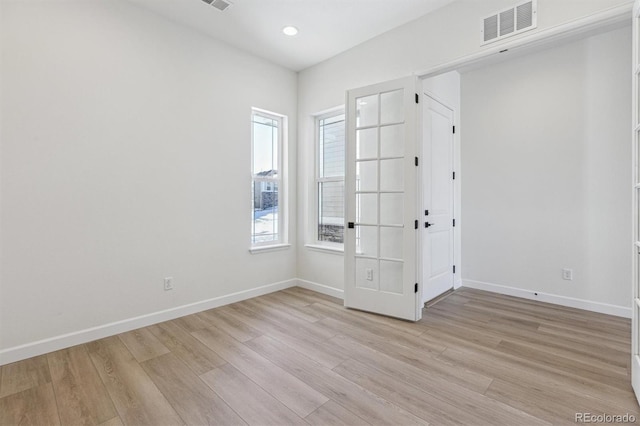 empty room featuring light hardwood / wood-style flooring