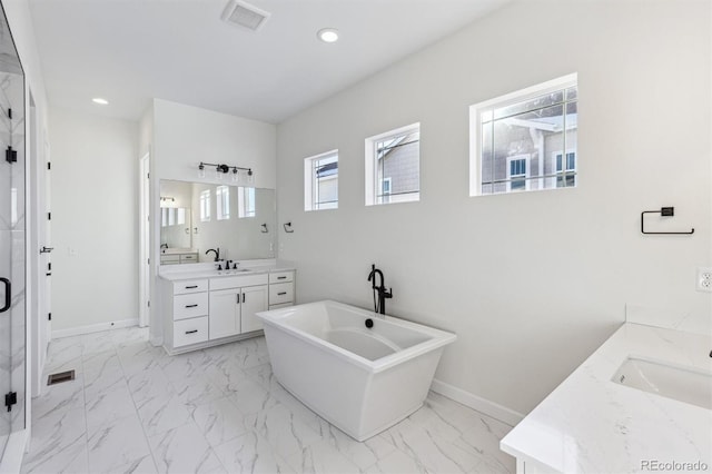 bathroom with independent shower and bath and vanity