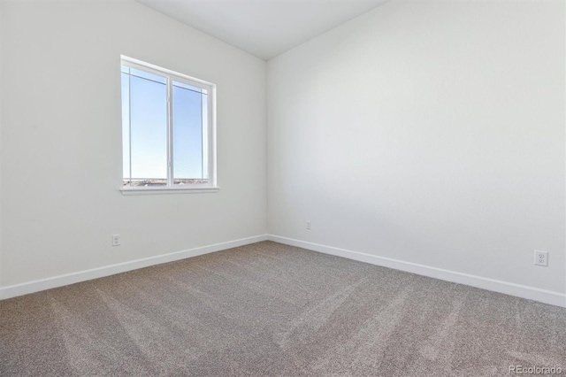 unfurnished room featuring carpet floors