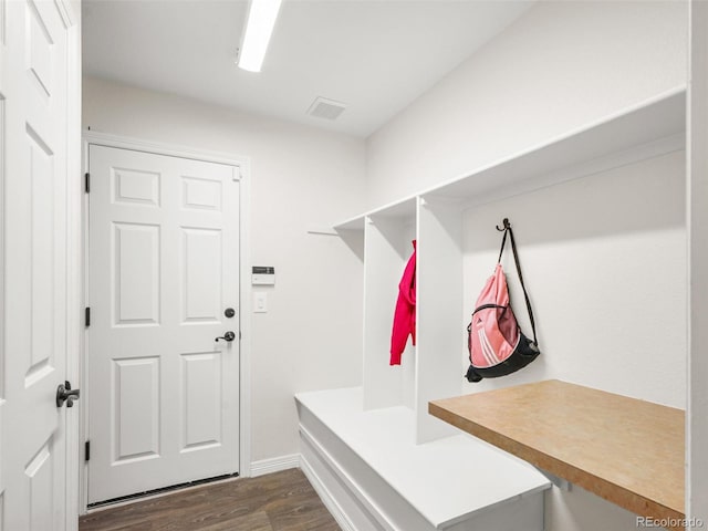 9464 E Aspen Hill Pl, Lone Tree, CO 80124 - mudroom featuring dark wood finished floors and baseboards