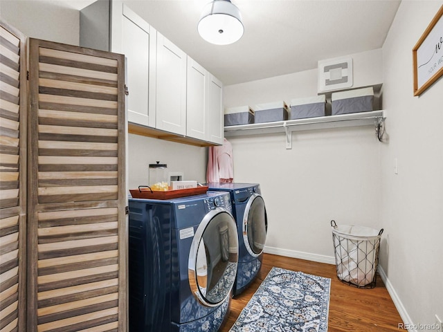 9464 E Aspen Hill Pl, Lone Tree, CO 80124 - washroom with cabinet space, washer and dryer, and wood finished floors