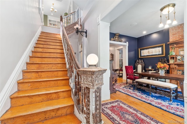 staircase featuring hardwood / wood-style floors