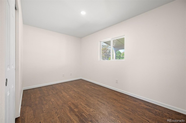 7870 Magnolia St, Commerce City, CO 80022 - empty room with dark wood-style floors, baseboards, and recessed lighting
