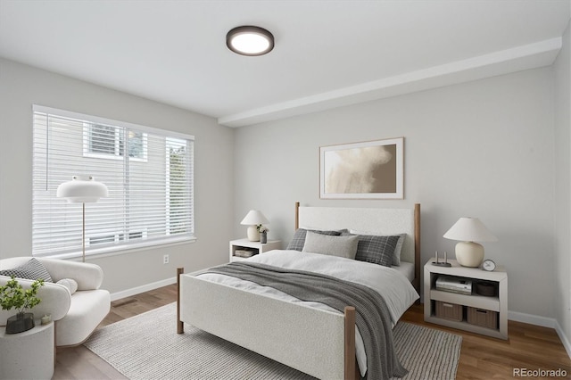 bedroom with wood-type flooring