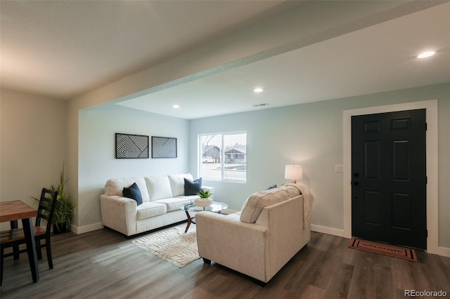 1450 Syracuse St, Denver, CO 80220 - living area featuring dark wood-type flooring, baseboards, and recessed lighting