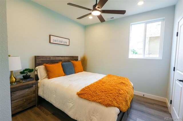 1450 Syracuse St, Denver, CO 80220 - bedroom with recessed lighting, wood finished floors, baseboards, and ceiling fan
