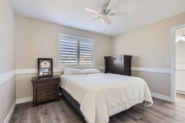 bedroom with baseboards, a ceiling fan, and wood finished floors