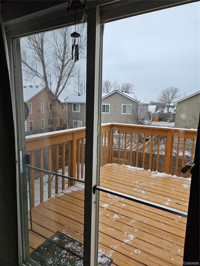 view of snow covered deck