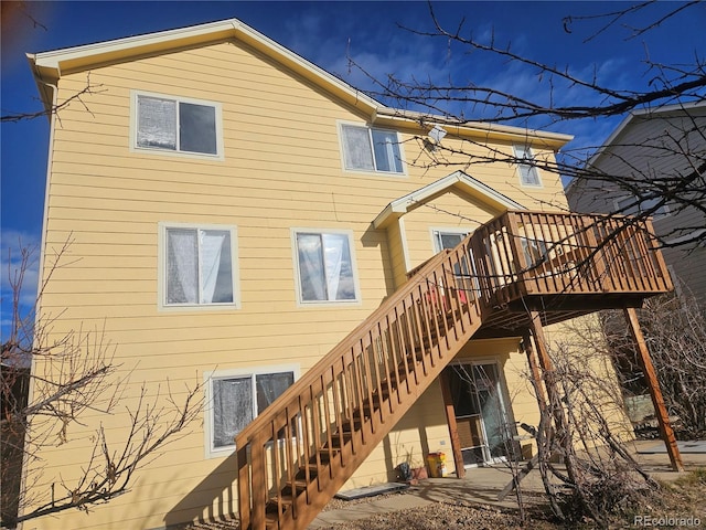 back of house with a patio area