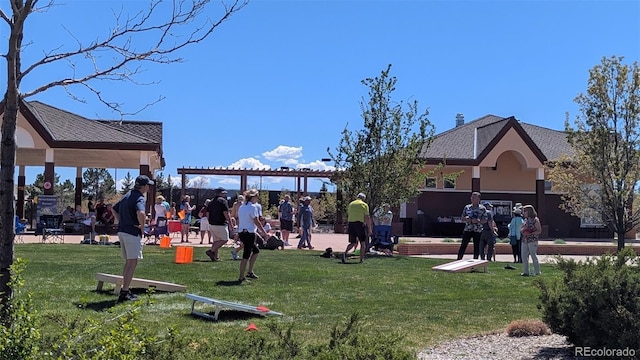 view of jungle gym featuring a lawn