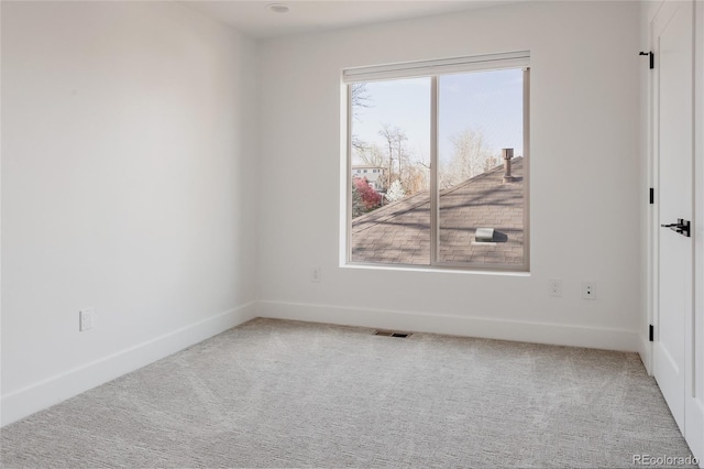 1322 Raleigh St, Denver, CO 80204 - carpeted empty room with baseboards and visible vents