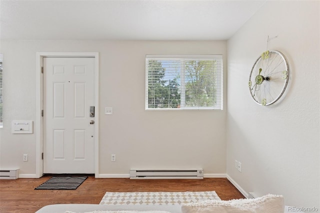 3715 Wolff St, Denver, CO 80212 - entryway featuring a baseboard radiator, wood finished floors, and baseboards