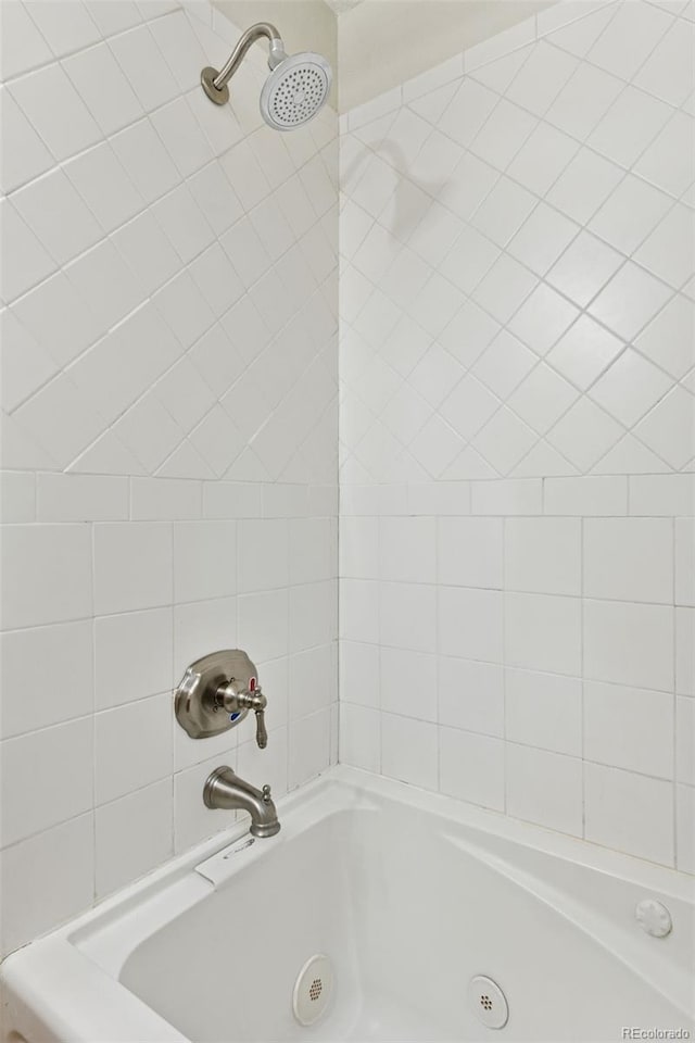 3715 Wolff St, Denver, CO 80212 - bathroom featuring washtub / shower combination