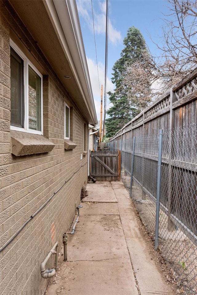3715 Wolff St, Denver, CO 80212 - view of home's exterior featuring brick siding