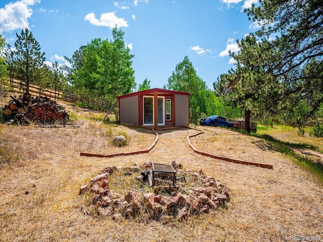 366 Houston St, Bailey, CO 80421 - view of yard featuring fence and an outdoor structure