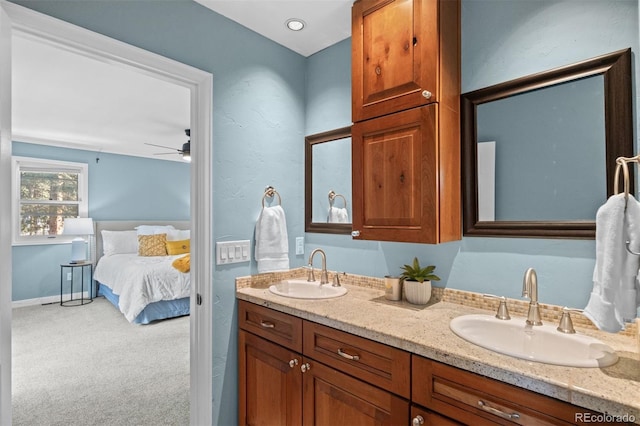 bathroom featuring vanity and ceiling fan