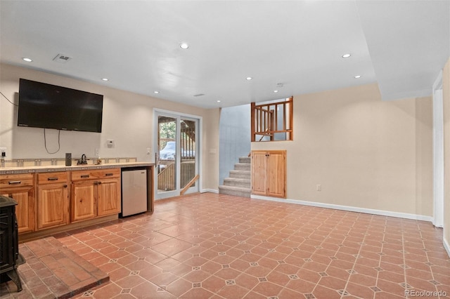 kitchen with sink and appliances with stainless steel finishes