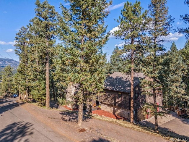 view of front of home with a mountain view