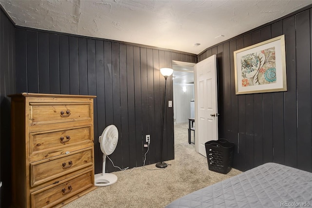 841 Crisman Dr Unit 9, Longmont, CO 80501 - carpeted bedroom featuring wood walls