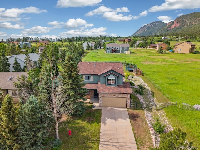 133 Wheat Ridge St, Palmer Lake, CO 80133 - aerial view of residential area with a mountainous background