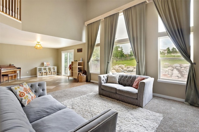 133 Wheat Ridge St, Palmer Lake, CO 80133 - living room featuring a towering ceiling