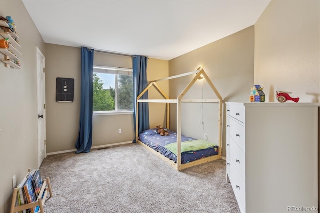 133 Wheat Ridge St, Palmer Lake, CO 80133 - carpeted bedroom with baseboards