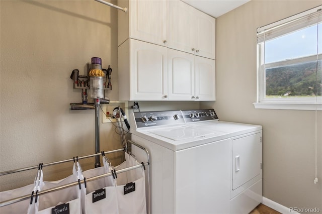 133 Wheat Ridge St, Palmer Lake, CO 80133 - laundry area with washing machine and clothes dryer and cabinet space