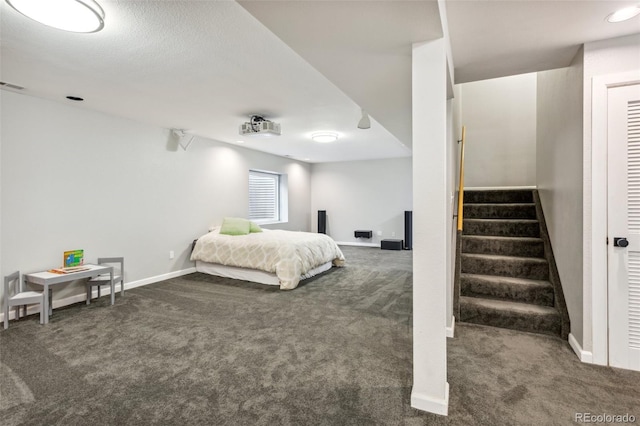 133 Wheat Ridge St, Palmer Lake, CO 80133 - bedroom featuring dark carpet