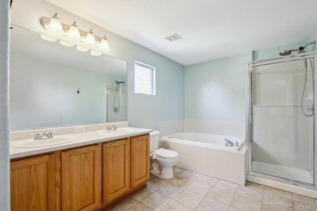 14625 Vine St, Thornton, CO 80602 - bathroom with a shower stall, a garden tub, double vanity, tile patterned floors, and a textured ceiling
