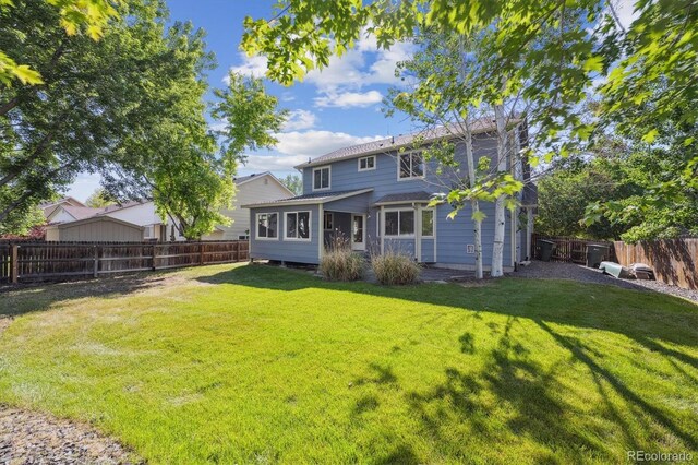 14625 Vine St, Thornton, CO 80602 - rear view of property with a fenced backyard