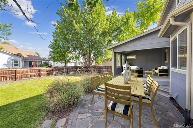 14625 Vine St, Thornton, CO 80602 - fenced backyard featuring a patio and outdoor dining space