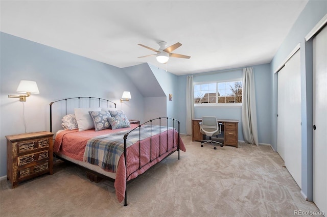 carpeted bedroom with a ceiling fan