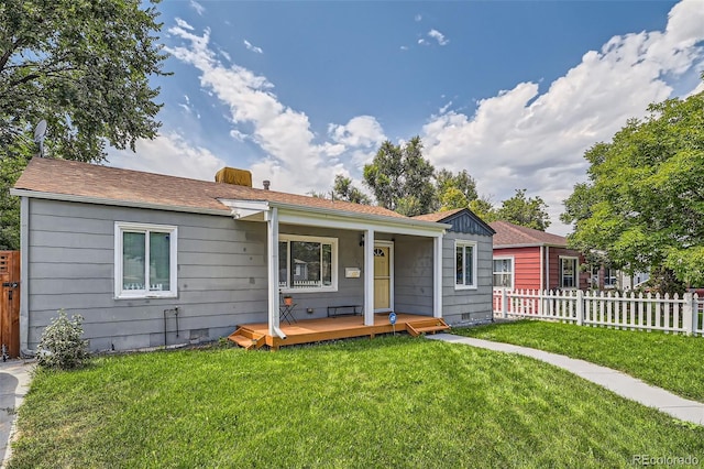 ranch-style house featuring a front yard