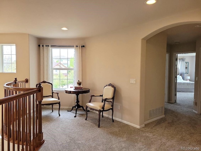 22386 E Arbor Pl, Aurora, CO 80016 - sitting room featuring arched walkways, carpet floors, and recessed lighting