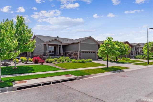 22656 E Glidden Dr, Aurora, CO 80016 - view of front facade with concrete driveway, a front yard, stone siding, and a porch