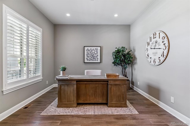 22656 E Glidden Dr, Aurora, CO 80016 - home office with healthy amount of natural light, dark wood-style flooring, and recessed lighting