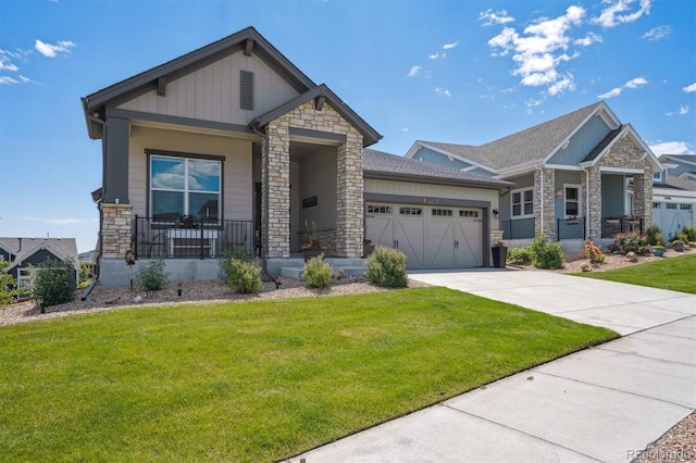 18926 W 94th Ave, Arvada, CO 80007 - craftsman house with stone siding, covered porch, an attached garage, and concrete driveway