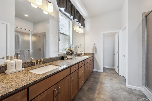 18926 W 94th Ave, Arvada, CO 80007 - full bathroom featuring a shower stall and double vanity